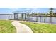 This waterfront residence has a private dock with a boat lift, complete with easy water access at 5174 Conner Ter, Port Charlotte, FL 33981