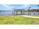 Waterfront home features a private dock and boat lift for easy access to the open water at 5174 Conner Ter, Port Charlotte, FL 33981