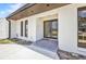 Inviting front entrance with double doors, modern lighting, and stylish accents at 5174 Conner Ter, Port Charlotte, FL 33981