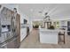 This amazing kitchen features modern appliances, island with seating, and a spacious open floor plan at 5174 Conner Ter, Port Charlotte, FL 33981