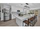 This gorgeous kitchen features an island with seating, modern appliances, and lots of storage at 5174 Conner Ter, Port Charlotte, FL 33981