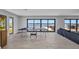 Living space offering waterfront views, a recreational area, and access to the outdoors at 5174 Conner Ter, Port Charlotte, FL 33981