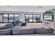 Comfortable living area with a cozy sofa and panoramic views of the water at 5174 Conner Ter, Port Charlotte, FL 33981