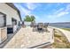 Spacious patio with barbeque and outdoor dining area offering stunning waterfront views at 5174 Conner Ter, Port Charlotte, FL 33981