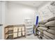 Storage room with shelves, hanging racks and a stack of cushions ready to store your personal belongings at 5174 Conner Ter, Port Charlotte, FL 33981