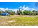 Large backyard featuring a shed and lots of room to make it your own at 530 Spaniards Rd, Placida, FL 33946