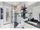 Well-lit bathroom features a glass shower, and modern vanity at 530 Spaniards Rd, Placida, FL 33946