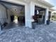 Three car garage with car lift and fishing pole storage at 530 Spaniards Rd, Placida, FL 33946