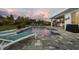 Relaxing pool area with sun loungers and outdoor bar, perfect for enjoying the sunset at 530 Spaniards Rd, Placida, FL 33946