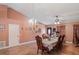 Bright dining room boasting high ceilings and tiled flooring at 5510 Moongate Rd, Spring Hill, FL 34606