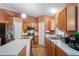 Spacious kitchen featuring stainless steel appliances and ample counter space at 5510 Moongate Rd, Spring Hill, FL 34606