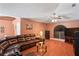 Comfortable living room with a leather sofa and entertainment center at 5510 Moongate Rd, Spring Hill, FL 34606