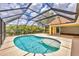 Inviting enclosed pool and patio, perfect for outdoor living and entertainment at 59 White Marsh Ln, Rotonda West, FL 33947