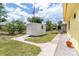 Backyard features a shed, landscaping, and well-maintained lawn at 6158 Cavan St, Englewood, FL 34224