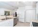 Open plan features an eat-in kitchen and cozy living space at 6158 Cavan St, Englewood, FL 34224