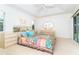 Spacious main bedroom features tray ceilings, lots of light, and modern decor at 6158 Cavan St, Englewood, FL 34224