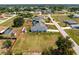 Expansive property featuring a well-maintained lawn, and a charming single Gathering home at 7048 Inland St, Englewood, FL 34224
