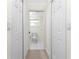 Neutral toned bathroom featuring a separate toilet room and closet at 7247 Brookhaven Ter, Englewood, FL 34224