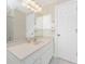 Inviting bathroom showcasing a modern vanity, sink, and a large mirror with views to the shower at 7247 Brookhaven Ter, Englewood, FL 34224