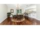 Dining space with a clear view to the kitchen and the pool area at 7247 Brookhaven Ter, Englewood, FL 34224