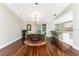 Well-lit dining space with easy access to kitchen and outdoor pool area at 7247 Brookhaven Ter, Englewood, FL 34224