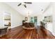 View of dining room with chandelier and access to pool area at 7247 Brookhaven Ter, Englewood, FL 34224