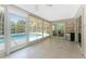 Patio featuring tile flooring, ceiling fan, and views of the pool at 7247 Brookhaven Ter, Englewood, FL 34224