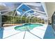 A beautiful screened-in pool and patio area great for entertaining or relaxing in the sun and shade at 7247 Brookhaven Ter, Englewood, FL 34224