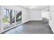 Unfinished basement with sliding glass doors opening to an outside staircase with beach access at 7420 Manasota Key Rd, Englewood, FL 34223