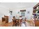 Cozy dining area with wood furnishings and natural light, offering a comfortable space for meals at 7420 Manasota Key Rd, Englewood, FL 34223