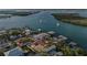 Waterfront home boasts convenient boat access and nearby coastal amenities at 7530 Whitcomb St, Englewood, FL 34223