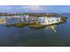 Beautiful waterfront condo complex with balconies overlooking the pristine water and marina at 8005 Bay Pointe Dr, Englewood, FL 34224