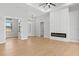 This home has a large living area, with a fireplace and wood floors at 8105 Antwerp Cir, Port Charlotte, FL 33981