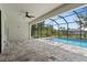 Open patio area with a screened-in pool offering a seamless indoor-outdoor living experience at 8105 Antwerp Cir, Port Charlotte, FL 33981