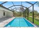 Screened pool with ample patio space at 8105 Antwerp Cir, Port Charlotte, FL 33981