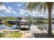 Private boat dock with boat lift provides direct access to the water at 8127 Consul St, Port Charlotte, FL 33981