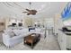 Open living room featuring tile floors and comfortable seating at 8127 Consul St, Port Charlotte, FL 33981