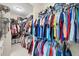 Spacious walk-in closet with organized shelving and hanging space for ample storage and easy access at 8127 Consul St, Port Charlotte, FL 33981