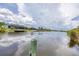 Enjoy serene water views from this property, located on a canal with boat docks and lush landscaping at 8127 Consul St, Port Charlotte, FL 33981