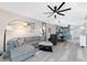 Open living area showcasing a modern kitchen with stainless appliances and a dining area at 8405 Placida Rd # 406, Placida, FL 33946