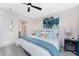 Bright main bedroom with ensuite bathroom, and luxury vinyl plank flooring at 8405 Placida Rd # 406, Placida, FL 33946