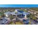 Community clubhouse featuring well-maintained landscaping and ample parking at 8411 Placida Rd # 404, Placida, FL 33946