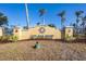 Attractive community sign with landscaping and a welcoming aesthetic at 8411 Placida Rd # 404, Placida, FL 33946