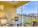 Enjoy this screened-in patio with seating and serene water views at 8411 Placida Rd # 404, Placida, FL 33946