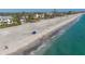 Wide sandy beach with clear turquoise water, perfect for swimming and sunbathing at 8500 Manasota Key Rd, Englewood, FL 34223