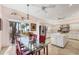 Open kitchen featuring an island, stainless steel appliances, and access to the outdoor deck at 8500 Manasota Key Rd, Englewood, FL 34223