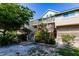 Coastal home with a gabled roof and multiple wooden decks, surrounded by lush landscaping at 9200 Little Gasparilla # 203, Placida, FL 33946