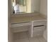 Bathroom vanity features drawers, countertop, and a mirror for a functional and stylish space at 1 Clubhouse Rd, Rotonda West, FL 33947