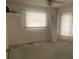 Bedroom features natural light, a closet door and trim, and is ready for your personal touch at 1 Clubhouse Rd, Rotonda West, FL 33947