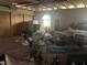 Garage contains a window for natural light, storage, and a door for access at 1 Clubhouse Rd, Rotonda West, FL 33947